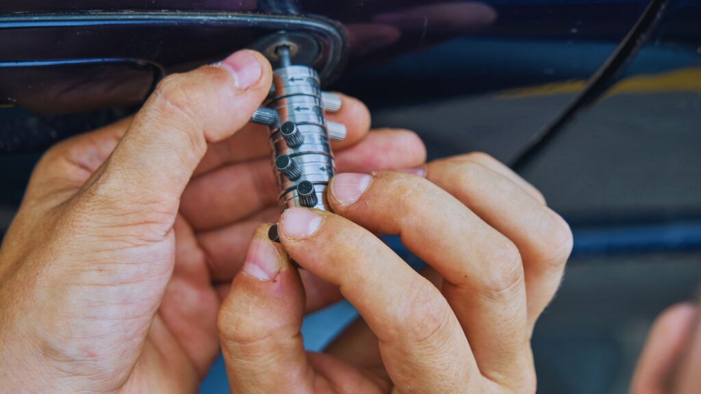 Licensed locksmith in OKC working on a commercial lock